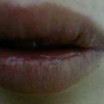 噛まれた私の唇